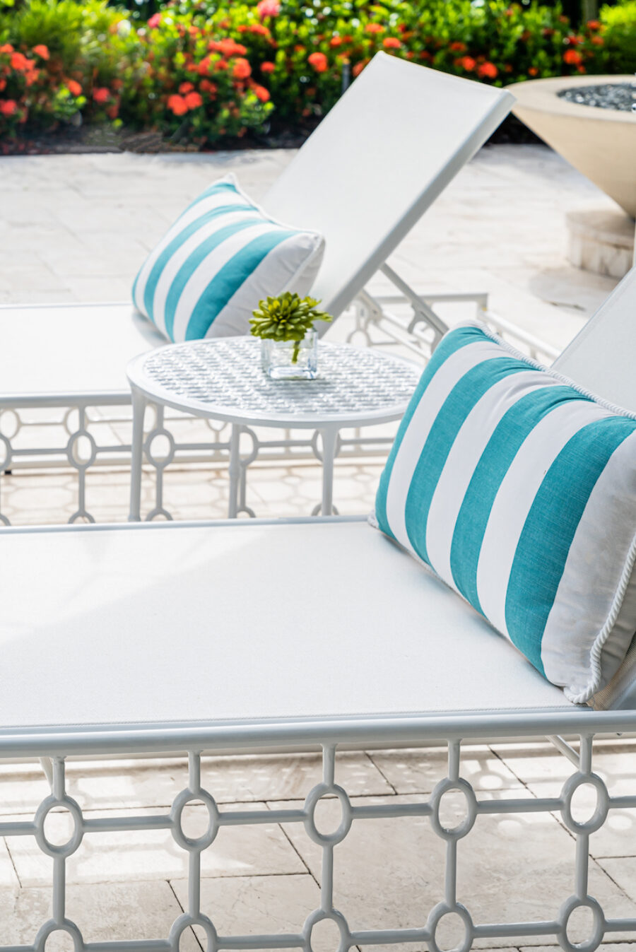teal-white-outdoor-pillows-lounge-chairs
